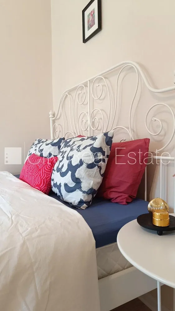 Bedroom; wood floor, natural light