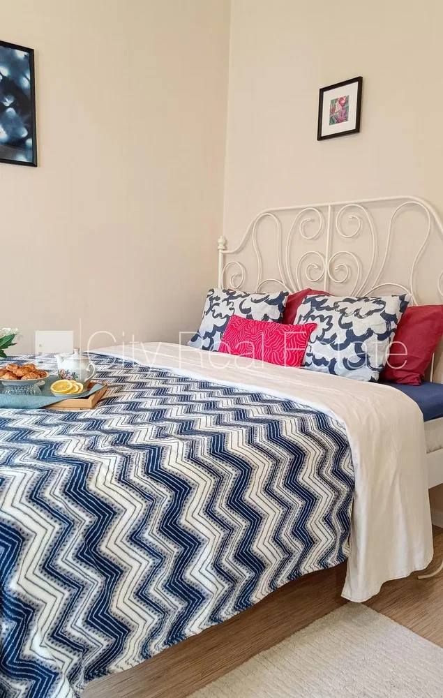 Bedroom; wood floor, natural light