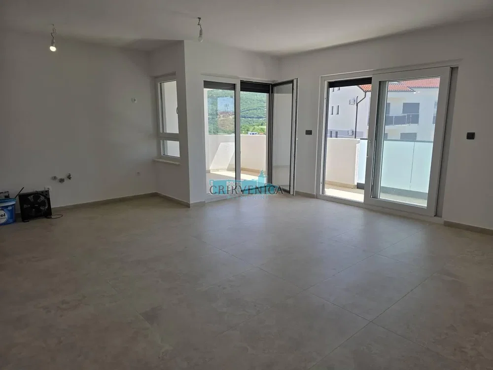 Living room; tile floor, natural light, needs renovation, view