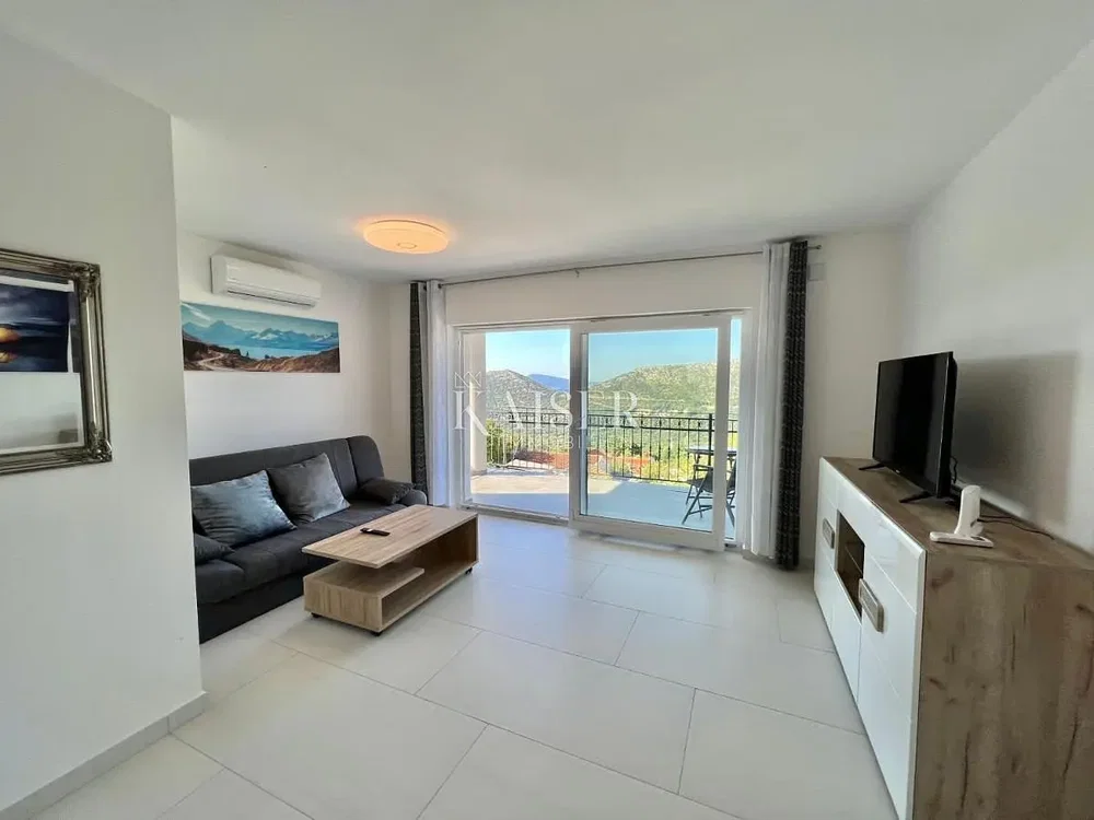 Living room; view, natural light, modern style, tile floor