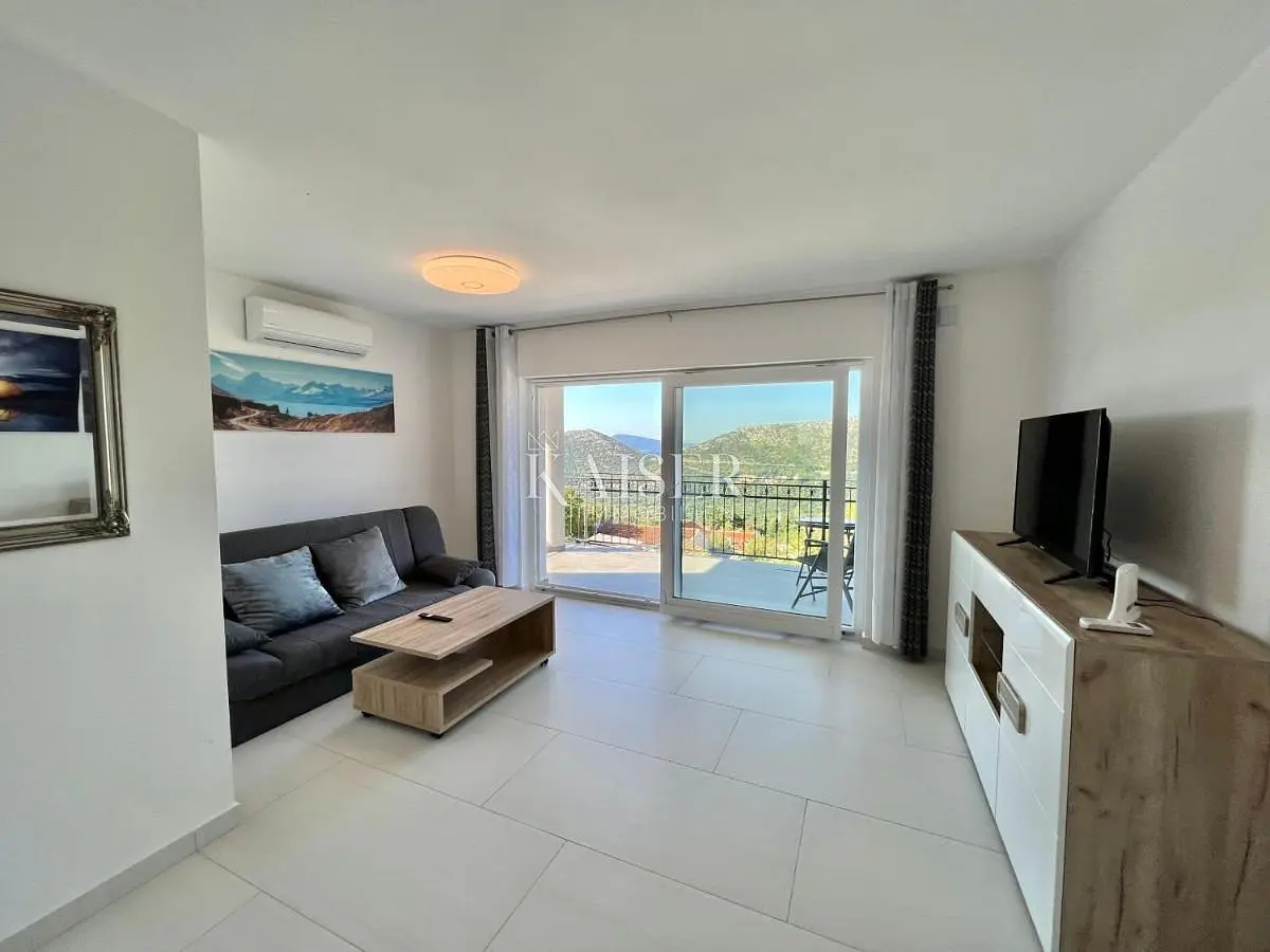 Living room; view, natural light, modern style, tile floor