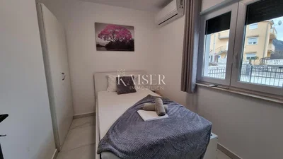 Bedroom; tile floor, natural light, view