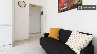 Soggiorno; pavimento in legno, luce naturale, stile moderno