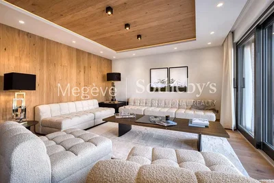 Soggiorno; stile moderno, travi in legno, luce naturale, pavimento in legno