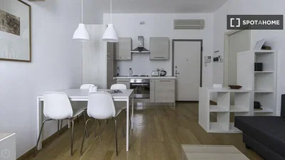 Sala de estar; eletrodomésticos, chão de madeira, luz natural, estilo moderno