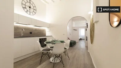 Cucina; elettrodomestici, pavimento in legno, luce naturale, stile moderno