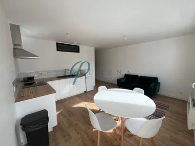 Kitchen; kitchen appliances, wood floor, natural light