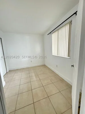 Bedroom; tile floor, natural light