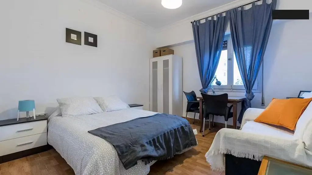 Bedroom; natural light, wood floor