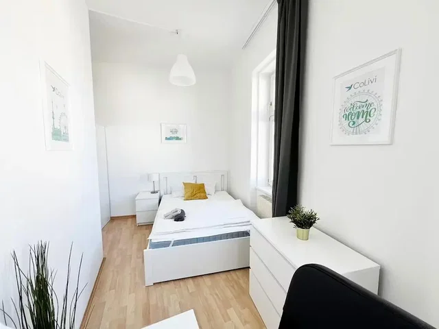 Bedroom; wood floor, natural light, modern style