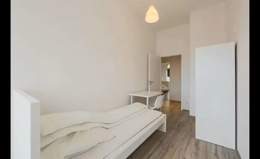 Bedroom; wood floor, natural light