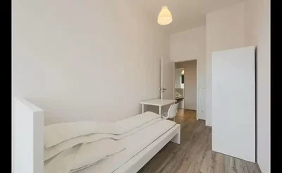 Bedroom; wood floor, natural light