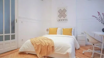 Bedroom; wood floor, natural light
