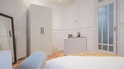 Bedroom; wood floor, natural light