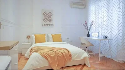 Bedroom; wood floor, natural light, modern style