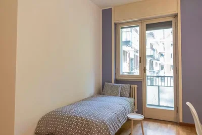 Bedroom; natural light, wood floor