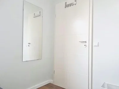 Vestiaire; parquet, lumière naturelle