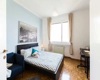 Bedroom; wood floor, natural light