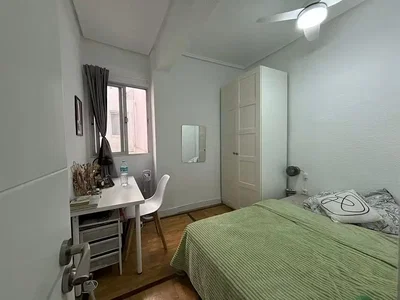 Bedroom; wood floor, natural light