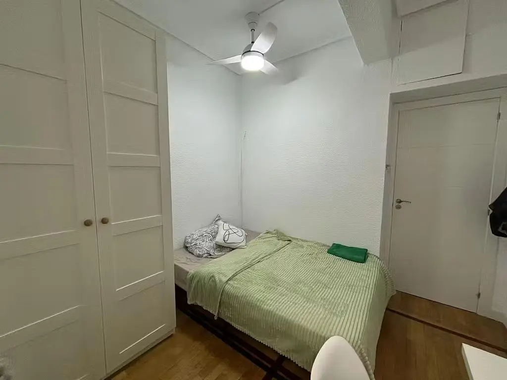 Bedroom; wood floor, natural light