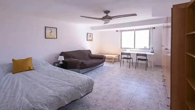 Bedroom; natural light, tile floor