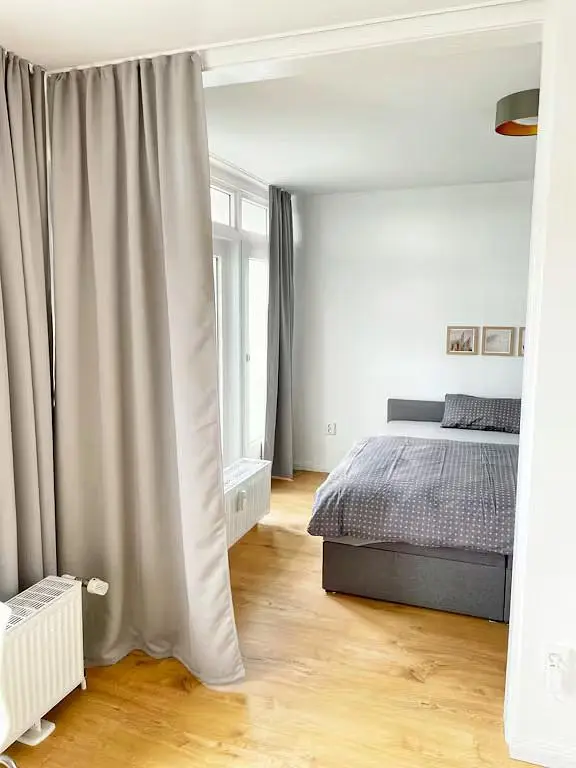 Bedroom; natural light, wood floor