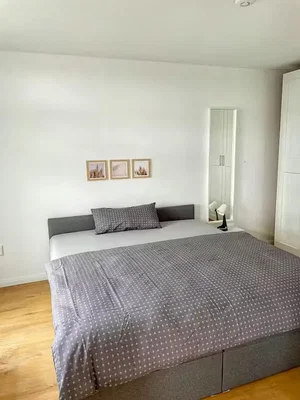Bedroom; wood floor, natural light