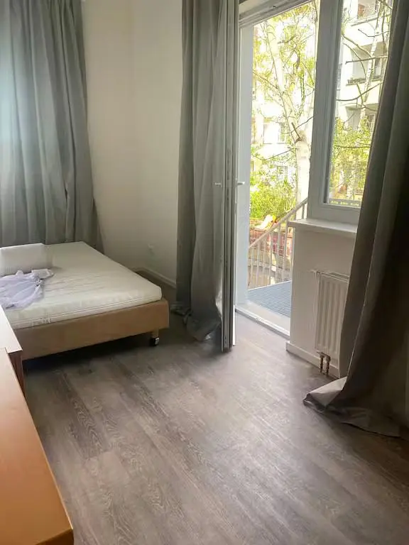 Bedroom; natural light, wood floor