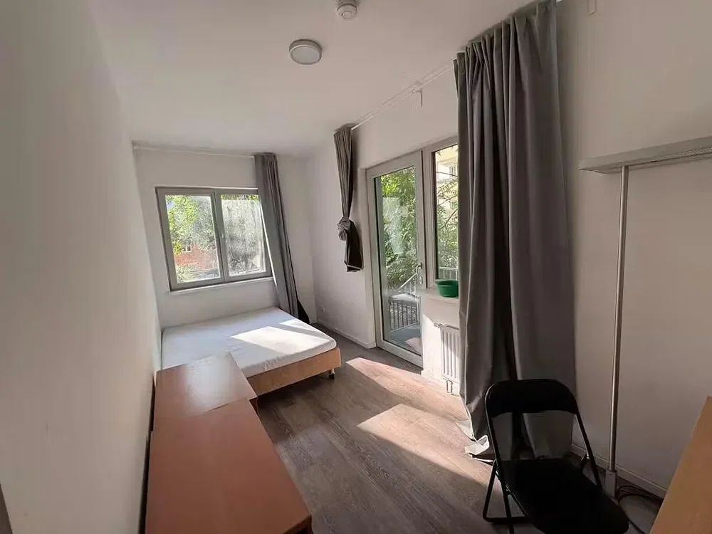Bedroom; natural light, wood floor