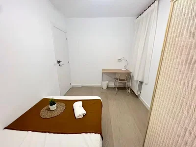 Bedroom; natural light, wood floor