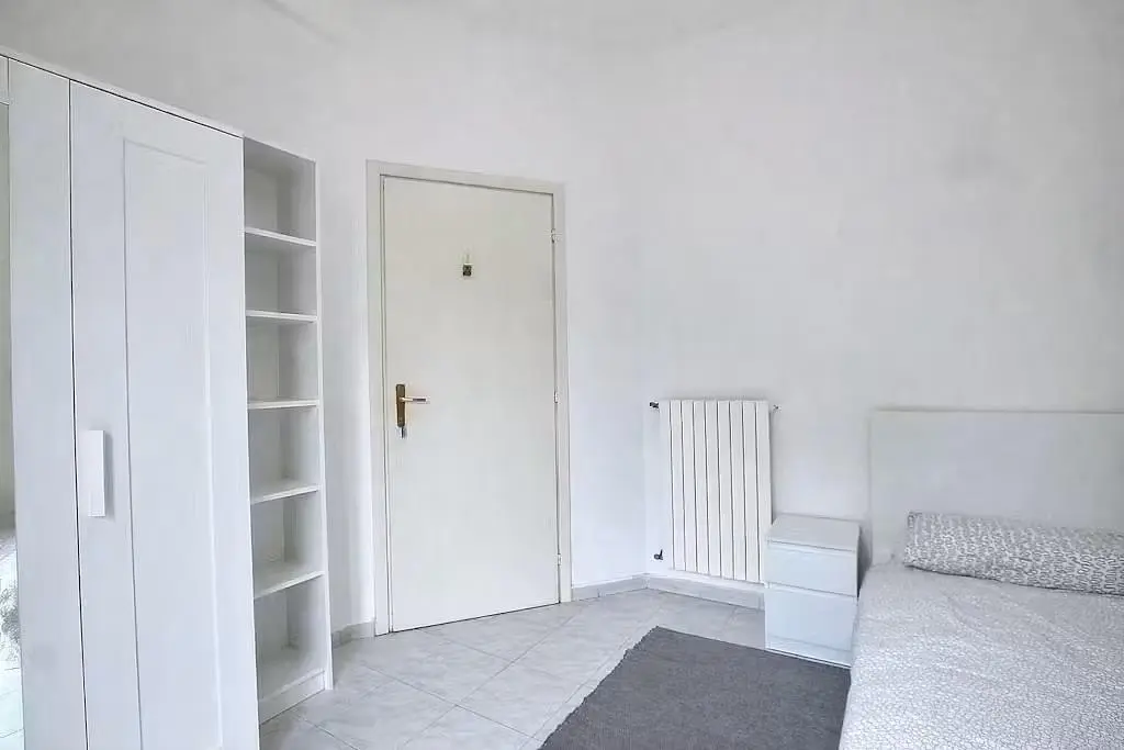 Bedroom; tile floor, natural light