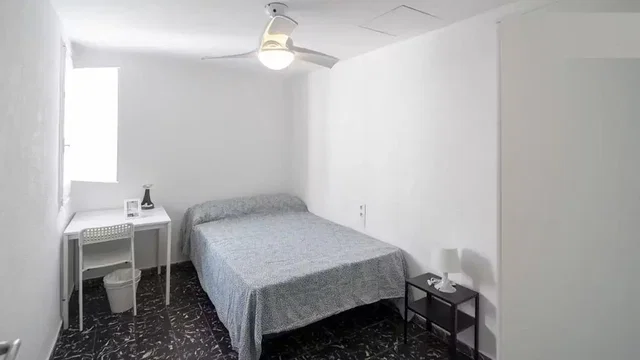 Bedroom; natural light, tile floor