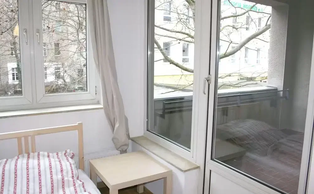 Spavaća soba; prirodno svjetlo, drveni pod