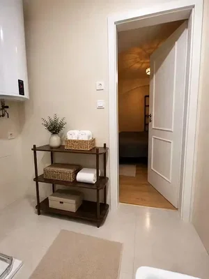 Bathroom; wood floor, tile floor, natural light