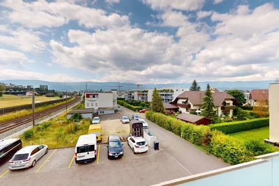 House and surroundings; view