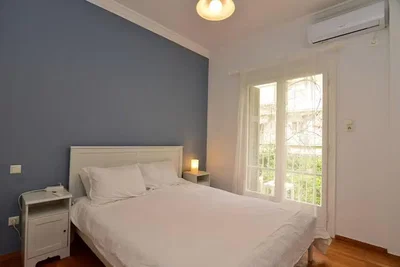 Slaapkamer; natuurlijk licht, houten vloer