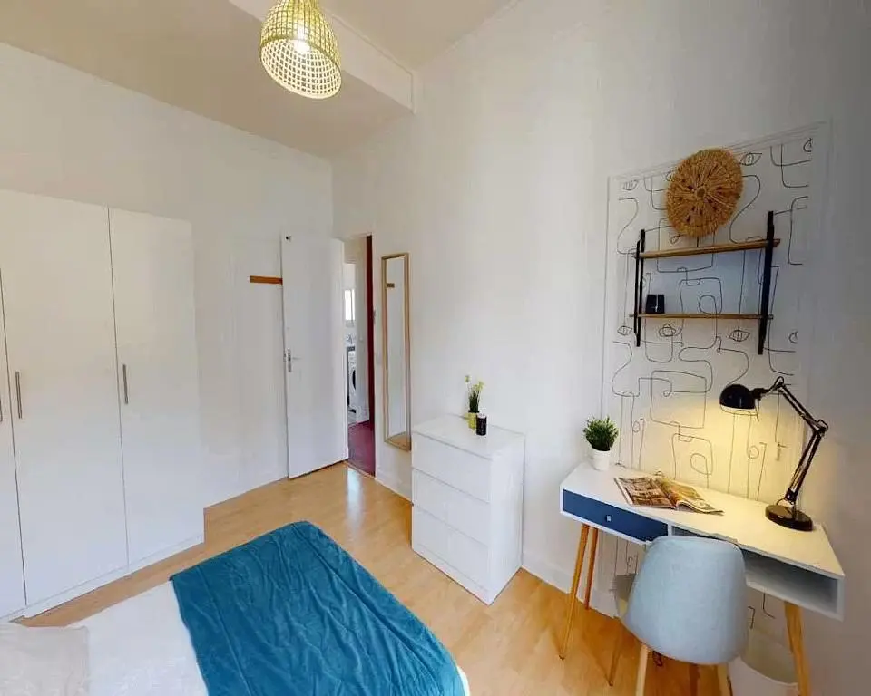 Bedroom; wood floor, natural light