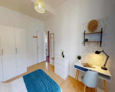 Bedroom; wood floor, natural light