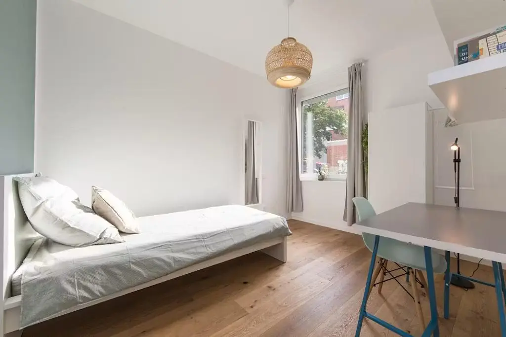 Bedroom; wood floor, natural light