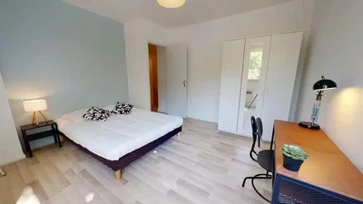 Bedroom; wood floor, natural light