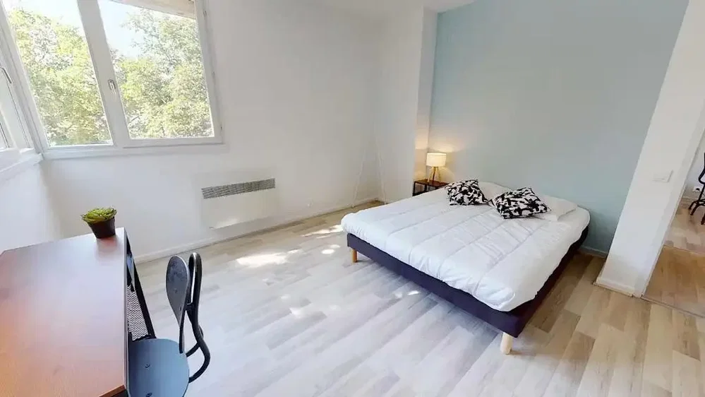 Bedroom; natural light, wood floor