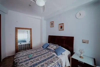 Slaapkamer; natuurlijk licht, houten vloer