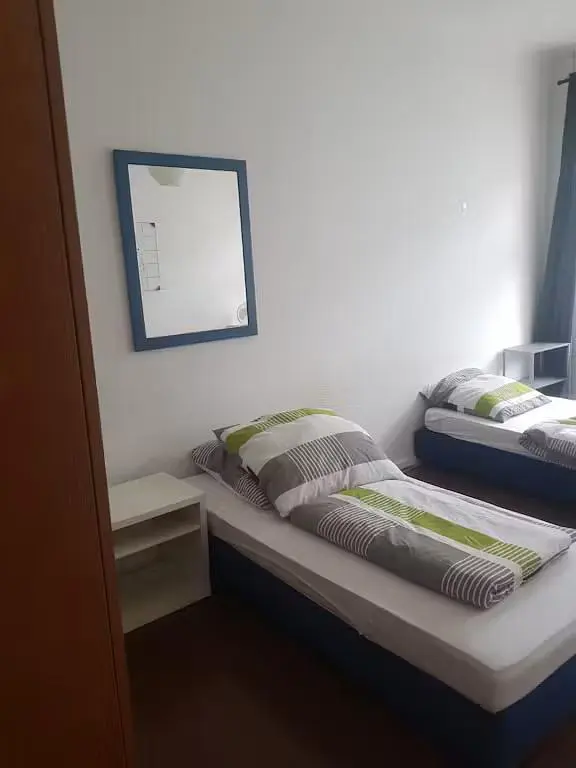 Bedroom; wood floor, natural light