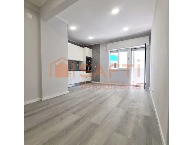 Living room; natural light, tile floor, renovated