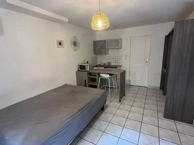 Bedroom; tile floor, kitchen appliances