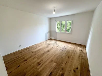 Bedroom; wood floor, natural light