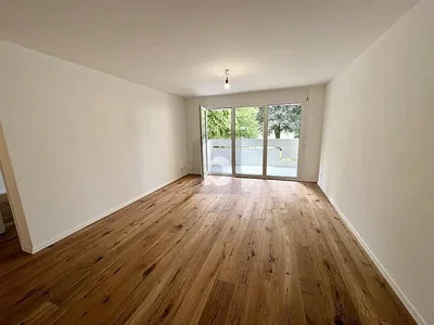 Living room; wood floor, natural light