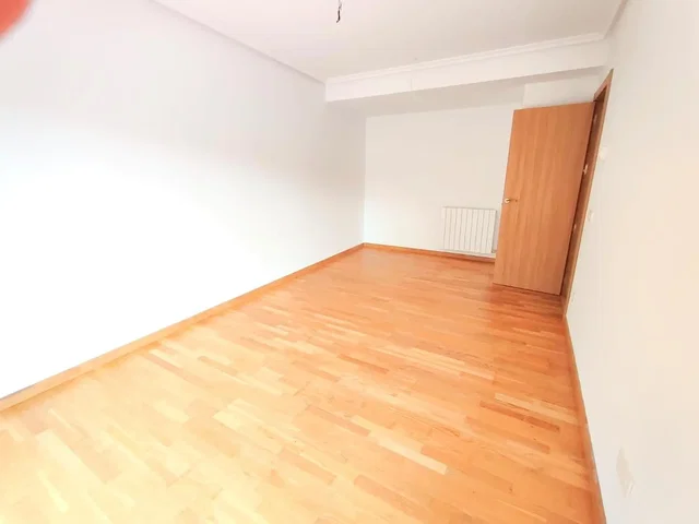 Bedroom; wood floor, natural light