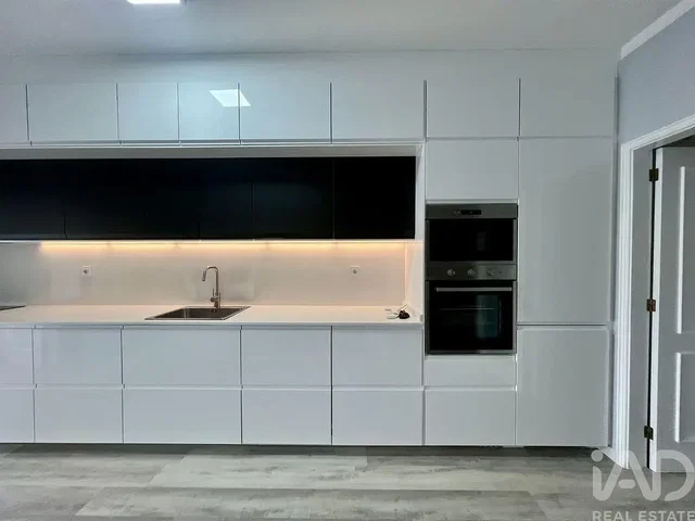 Kitchen; kitchen appliances, tile floor, natural light, renovated