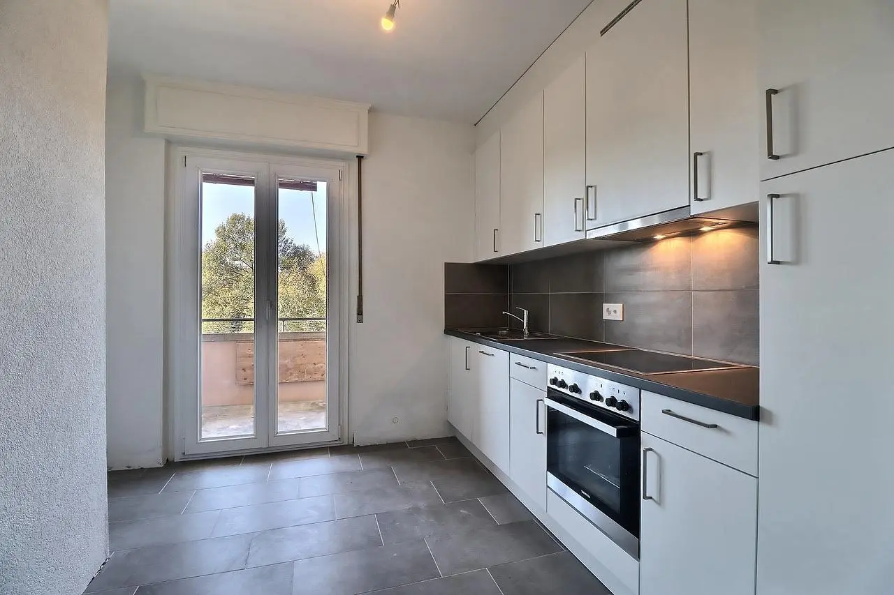 Kitchen; tile floor, kitchen appliances, natural light, view